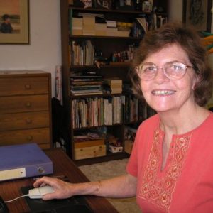Photo of Elaine Forrestal at her desk